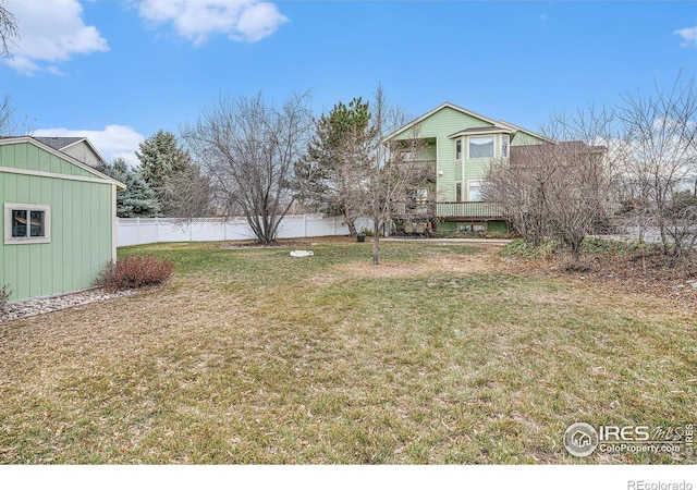 view of yard featuring a wooden deck