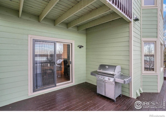 deck with area for grilling