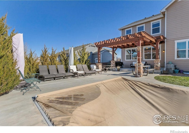 exterior space featuring a pergola