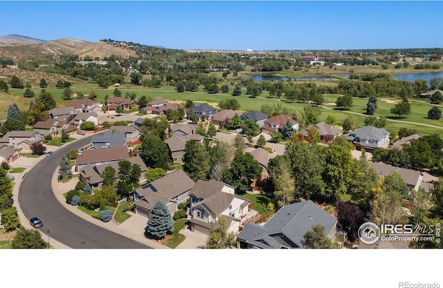 aerial view with a water and mountain view