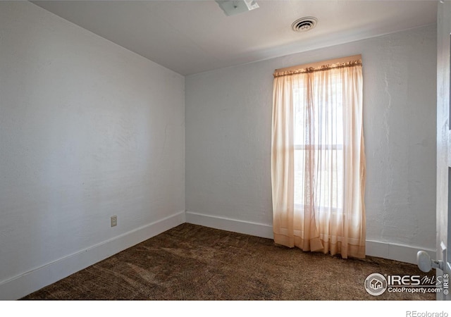 empty room featuring carpet