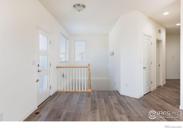 foyer featuring dark hardwood / wood-style floors