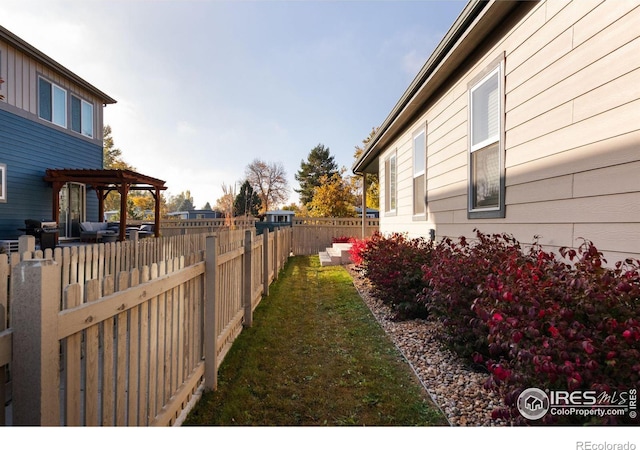 view of yard with a pergola