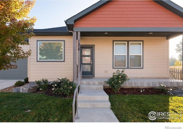 view of front of property with a front lawn and a porch