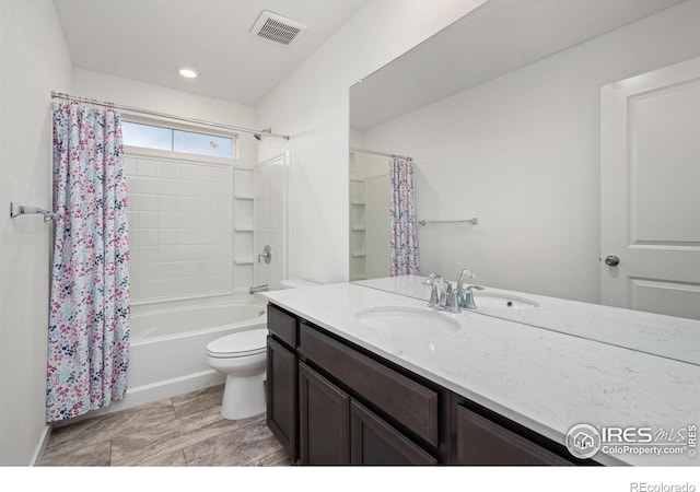 full bathroom featuring toilet, shower / bath combination with curtain, vanity, and visible vents