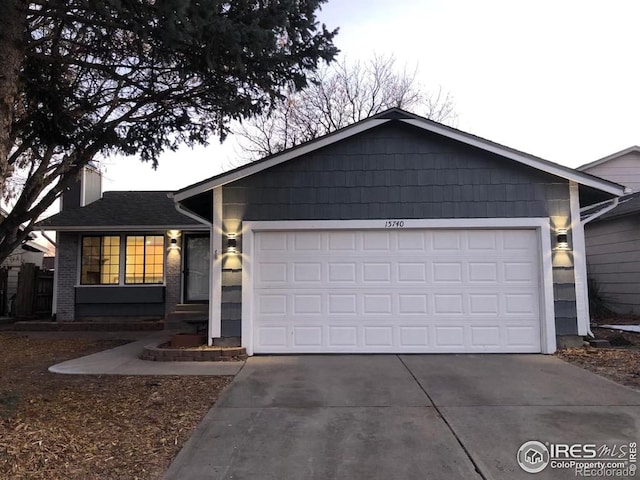 ranch-style home with a garage