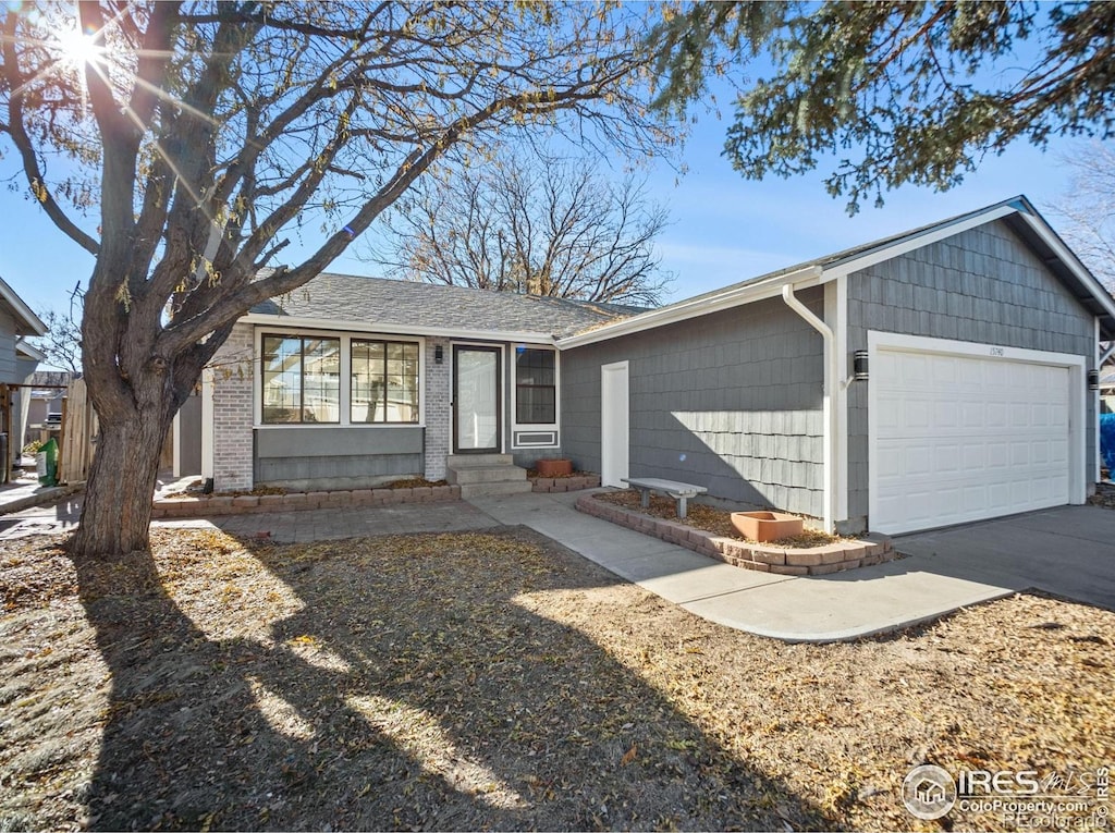 ranch-style house featuring a garage