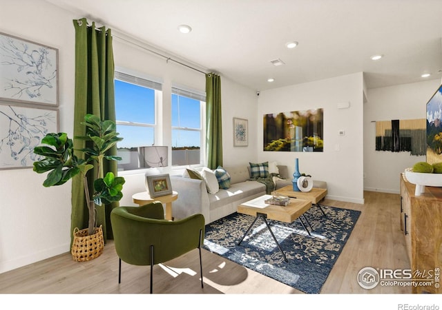 living room featuring light hardwood / wood-style floors