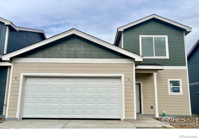 craftsman inspired home with a garage