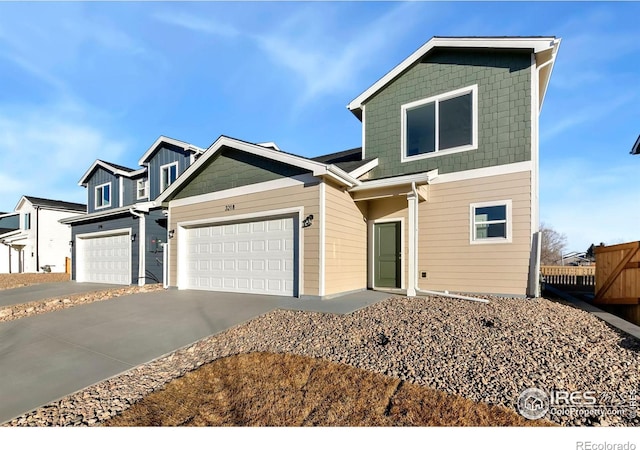 craftsman inspired home with a garage