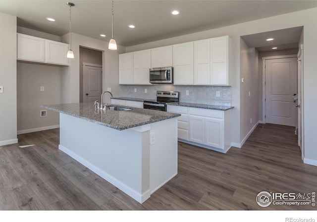 kitchen with white cabinets, sink, and appliances with stainless steel finishes