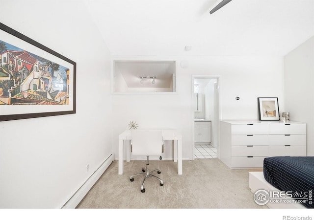 office space with light colored carpet and a baseboard heating unit