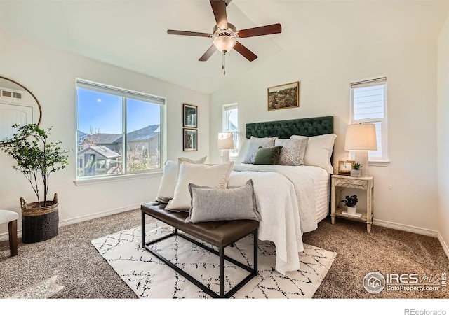 bedroom with light colored carpet, vaulted ceiling, and ceiling fan