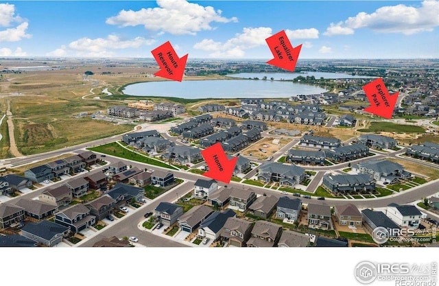 3583 Booth Falls Dr, Loveland, CO 80538 - aerial perspective of suburban area featuring a large body of water