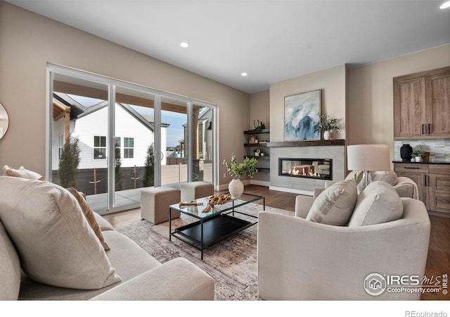 living room with light hardwood / wood-style flooring