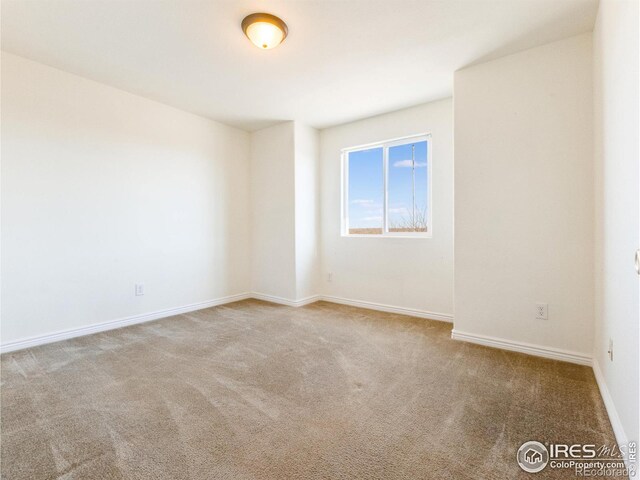 empty room featuring carpet