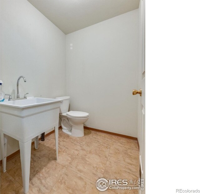 bathroom featuring toilet