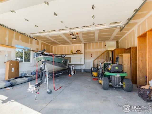 garage featuring a garage door opener