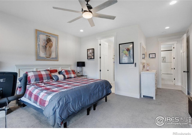 bedroom featuring ceiling fan and light colored carpet