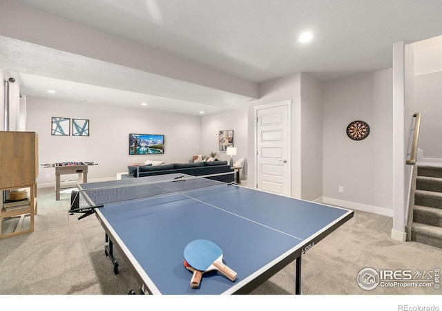 playroom featuring light colored carpet