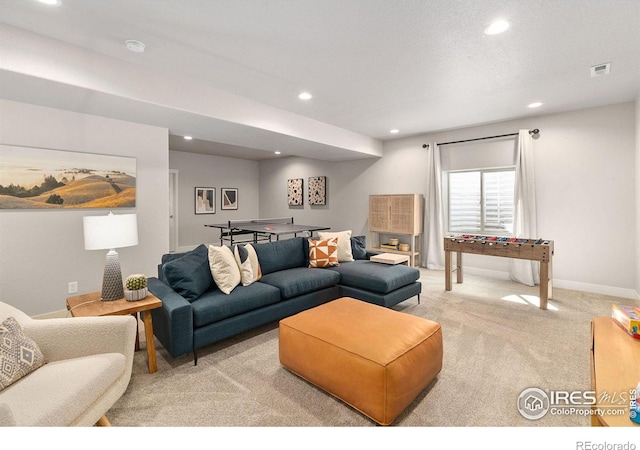 living room featuring light colored carpet