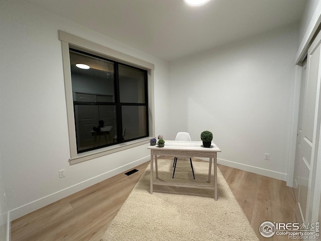 office space featuring light wood-type flooring