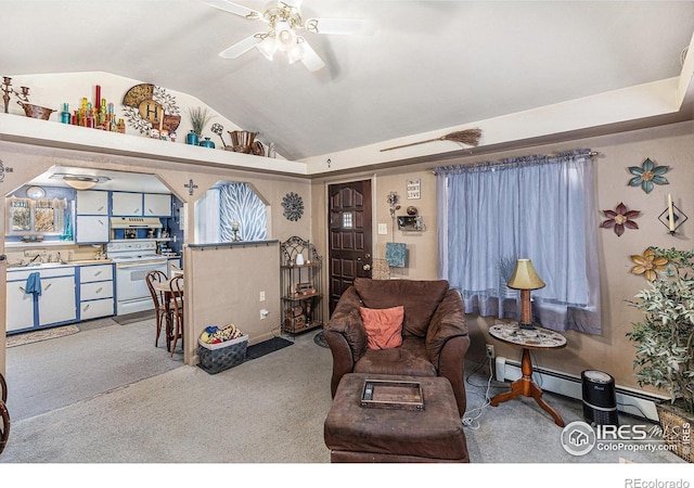 living room with ceiling fan, sink, baseboard heating, lofted ceiling, and light carpet