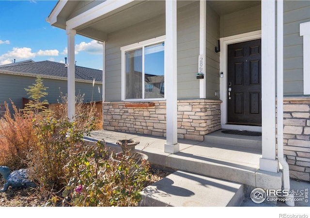 entrance to property with covered porch