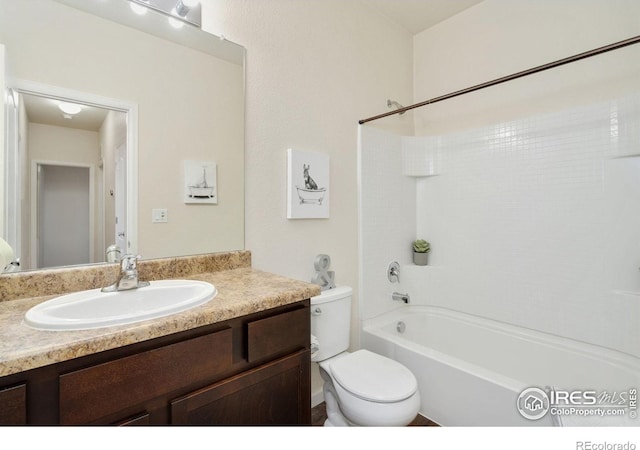 full bathroom featuring shower / tub combination, vanity, and toilet