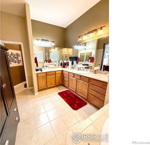 bathroom featuring tile patterned flooring and vanity