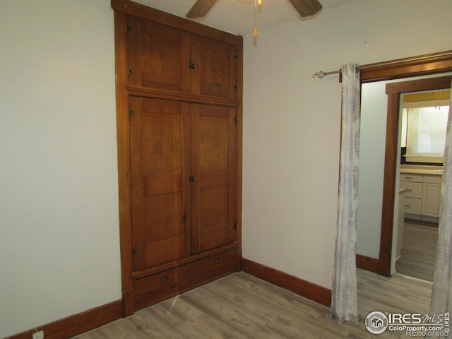 hallway with light wood-type flooring