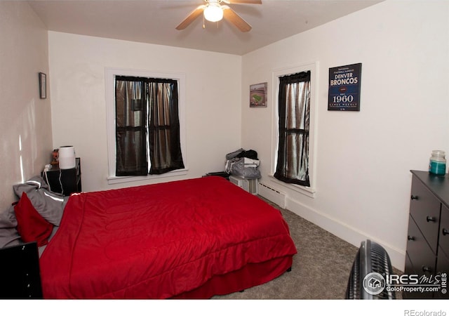 carpeted bedroom with ceiling fan