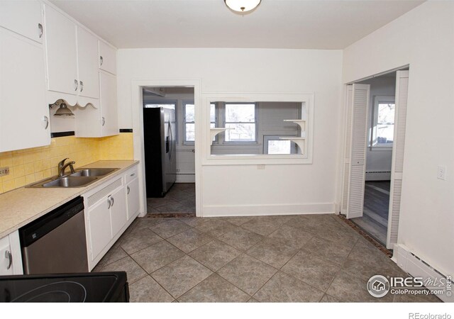 kitchen featuring white cabinetry, appliances with stainless steel finishes, and sink