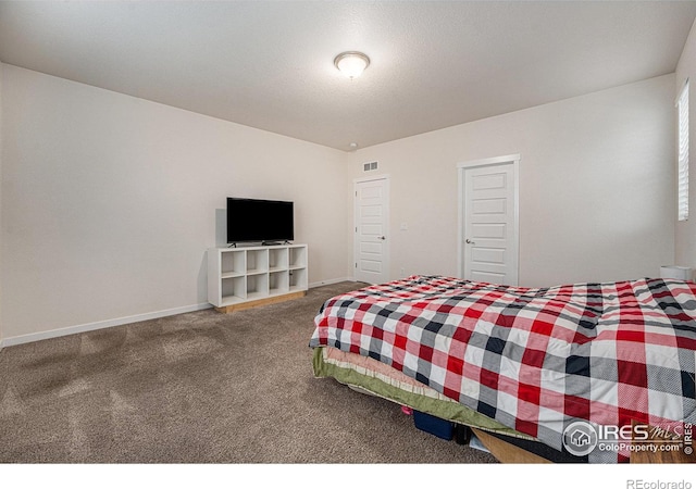 carpeted bedroom with a closet