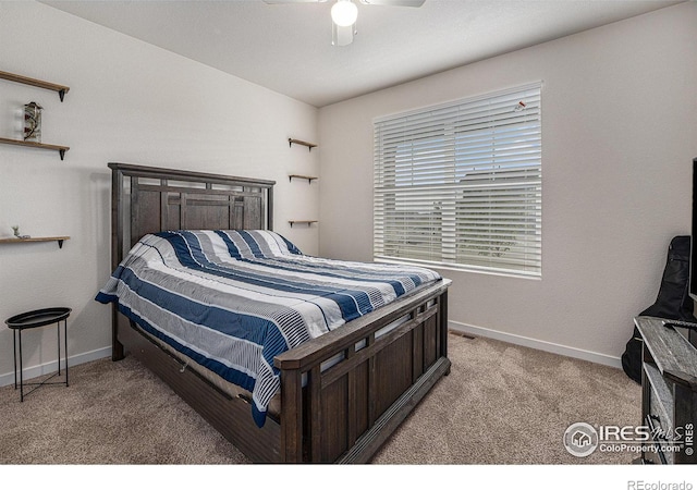 carpeted bedroom with ceiling fan