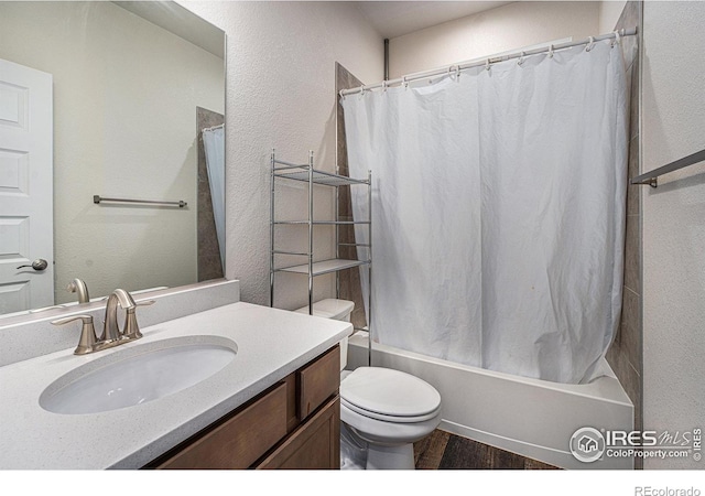 full bathroom with shower / tub combo, vanity, toilet, and wood-type flooring