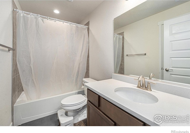 full bathroom with shower / bath combination with curtain, vanity, and toilet