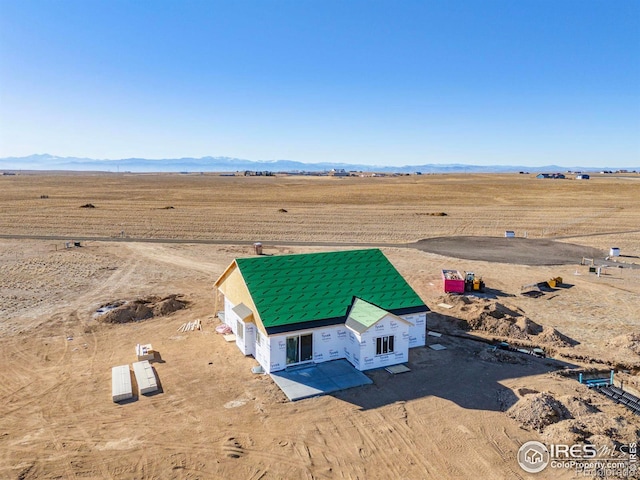 bird's eye view featuring a mountain view and a rural view