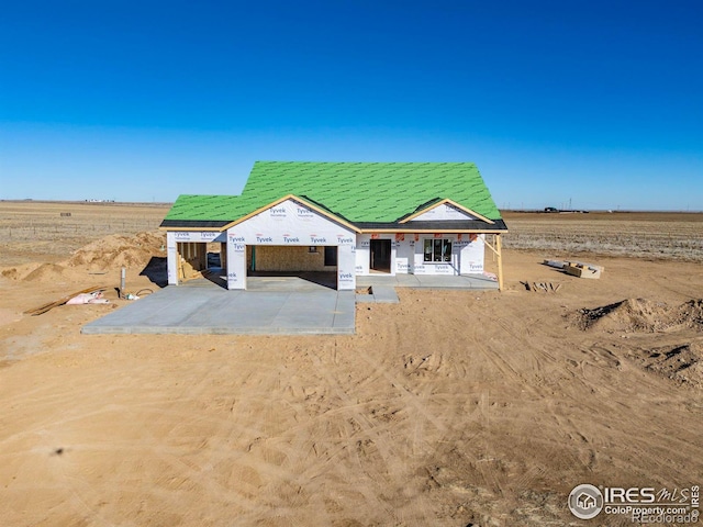 unfinished property featuring a rural view