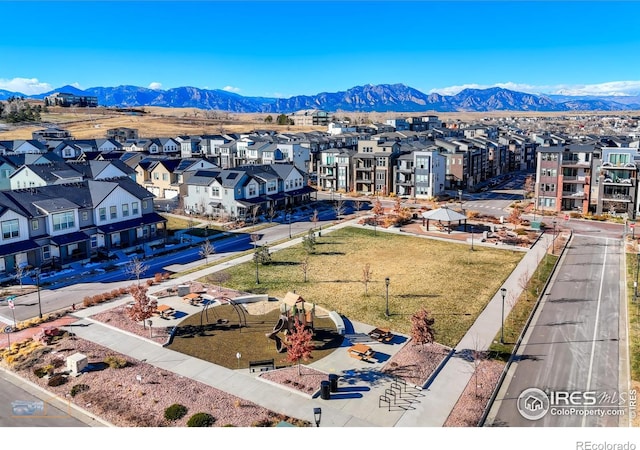 birds eye view of property featuring a mountain view