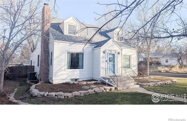 cape cod-style house featuring central air condition unit