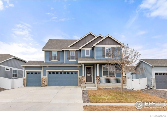 craftsman-style house featuring a porch and a garage