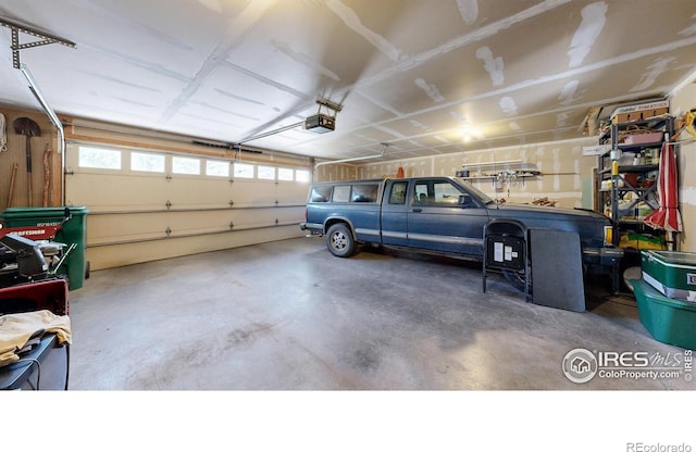 garage featuring a garage door opener