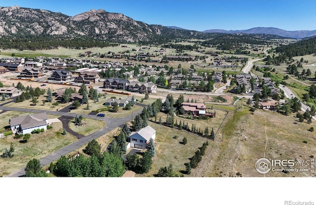 bird's eye view with a mountain view