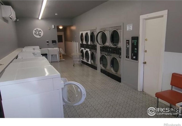 clothes washing area featuring stacked washer / dryer, separate washer and dryer, and an AC wall unit