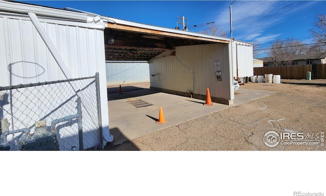 view of property exterior featuring an outdoor structure