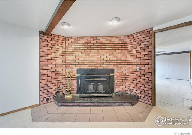 details featuring beam ceiling, carpet, a textured ceiling, and a brick fireplace