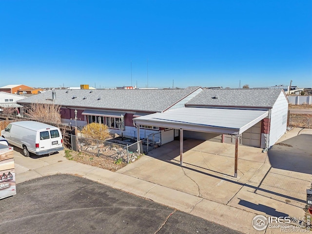 single story home with a carport