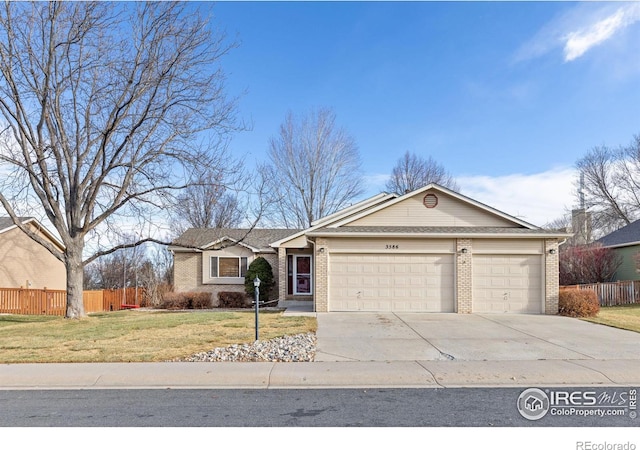 single story home featuring a front yard and a garage