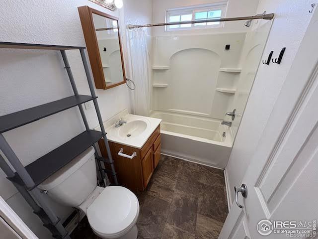 full bathroom with vanity, toilet, and shower / bathtub combination with curtain